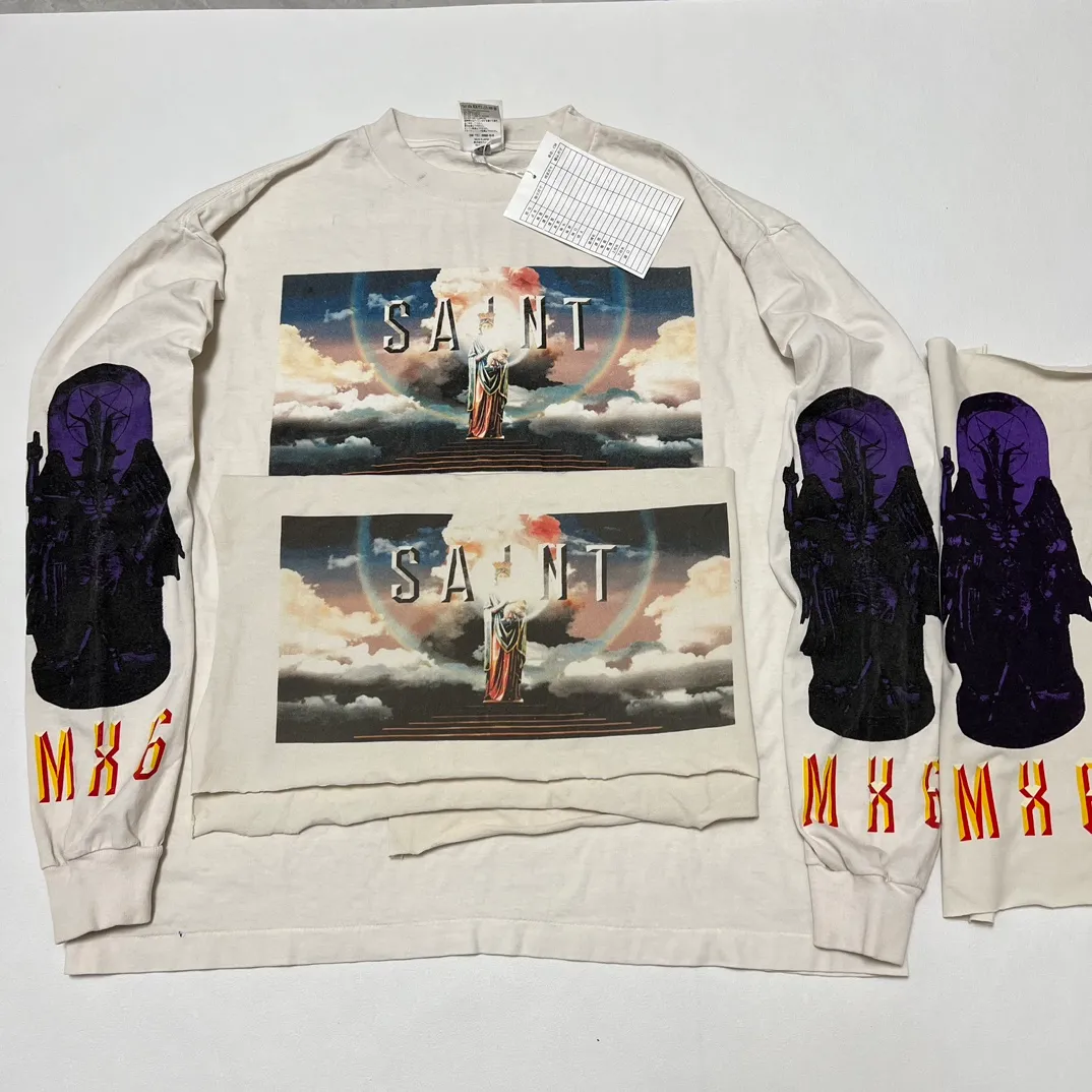 Printing proofing SAINT Mxxxxxx SAINT PICTURES L/S TEE/WHITE Columbia Pictures SAINT Goddess Long Sleeve Off-White S-XL Pays tribute to the Columbia Pictures Title Goddess. Full of fun. Ready-made garments are washed. The texture is soaring. Authentic level printing is restored. Look for cylindrical seamless fabrics. If it is not a cylindrical fabric, it is almost boring.